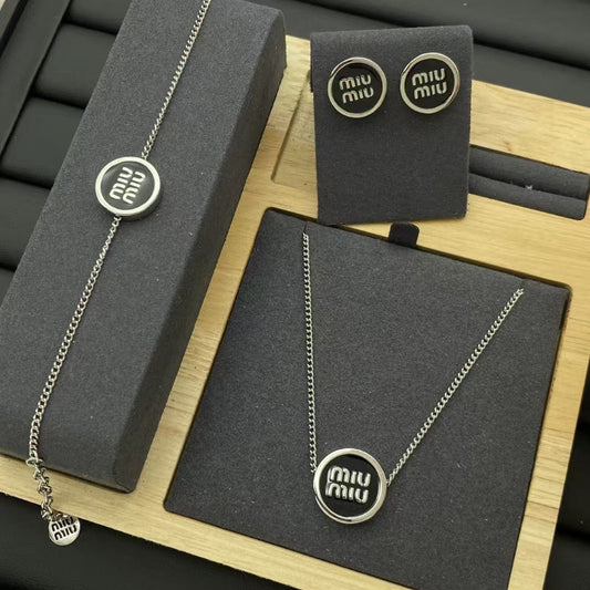 Miu Miu Enamel Logo Jewelry Set in Silver

