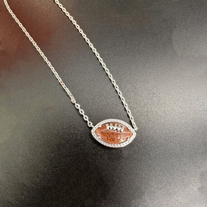 Unique Kendra Scott Football Pendant