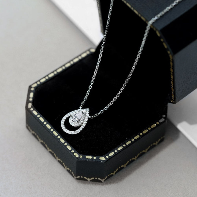 Chic Silver Pear Cut Crystal within a Pave Outline

