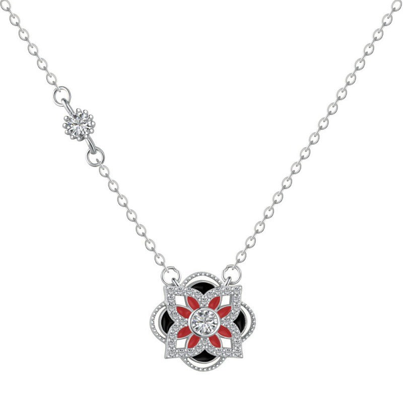 Chic Silver Cloverette Necklace with Central Red and Black Petals

