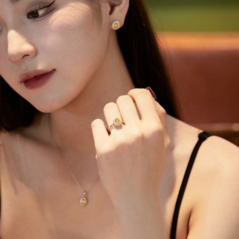 Delicate Yellow Oval with Diamond Halo

