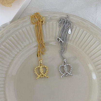 Delicate Gold Rope Heart Charm


