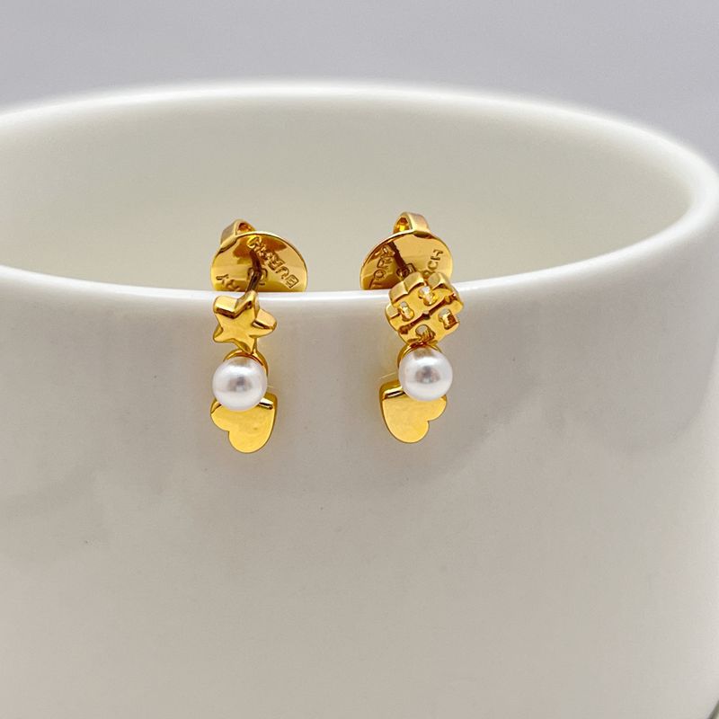 Tory Burch gold-tone heart and star earrings with pearl accents, asymmetric drop