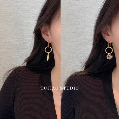 Loewe asymmetrical pendant metal earrings