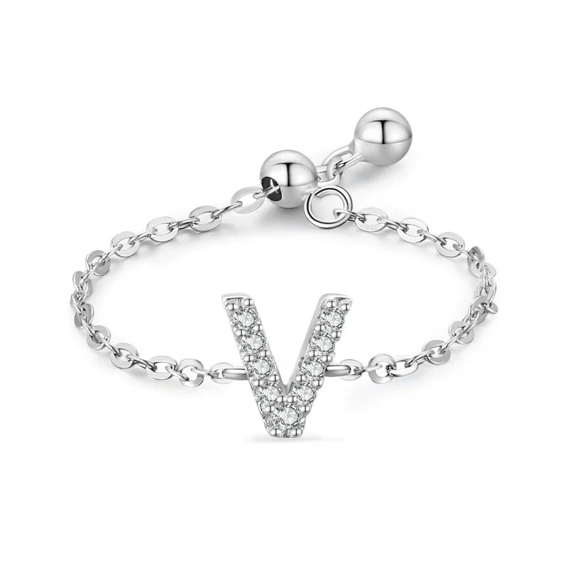 Pavé initial letter bracelet with a “V” charm in sterling silver with link chain