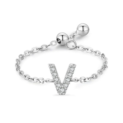 Pavé initial letter bracelet with a “V” charm in sterling silver with link chain