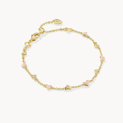 Adjustable heart charm bracelet with gold-tone chain and small pink heart links and center tag.
