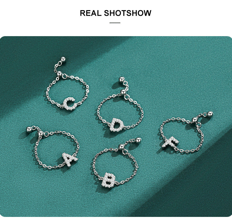 Sterling silver initial letter bracelets with pavé charms and round clasp beads