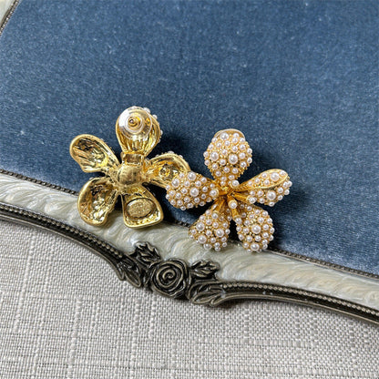 Five-petal flower stud earrings with white crystal pavé on gold-tone setting