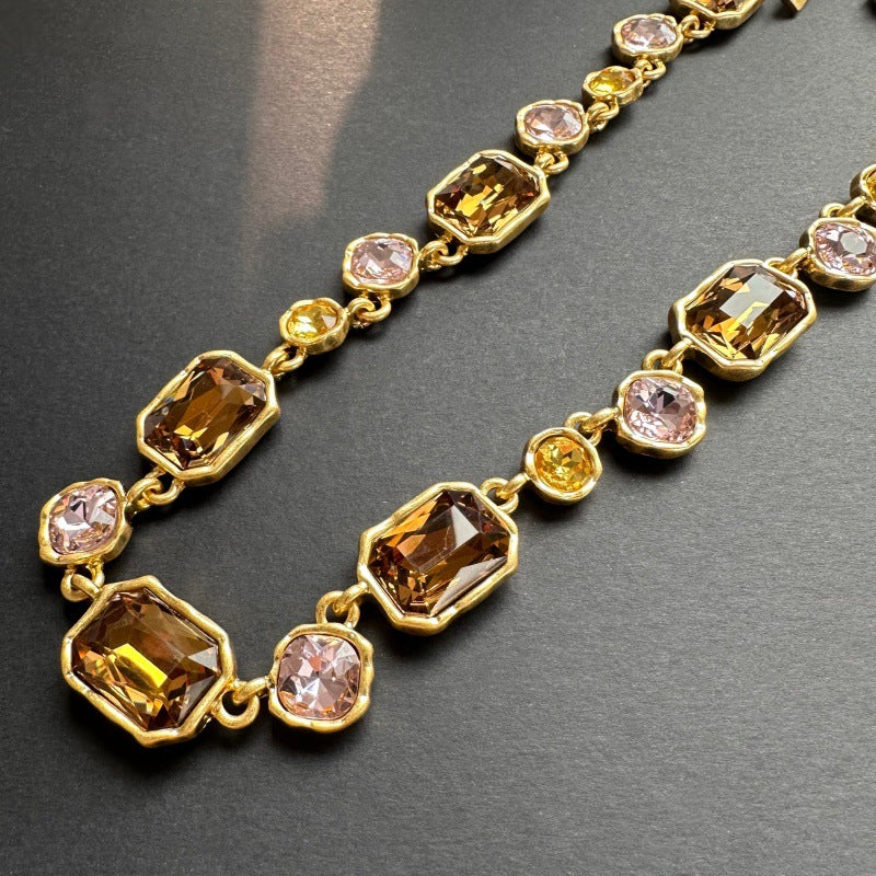 Square crystal pendant necklace with champagne and clear faceted crystals on gold chain