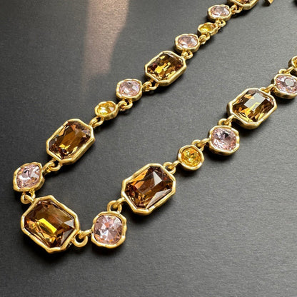 Square crystal pendant necklace with champagne and clear faceted crystals on gold chain