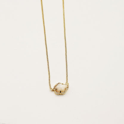 Kendra Scott gold-tone mother-of-pearl necklace with light iridescent rhombus pendant