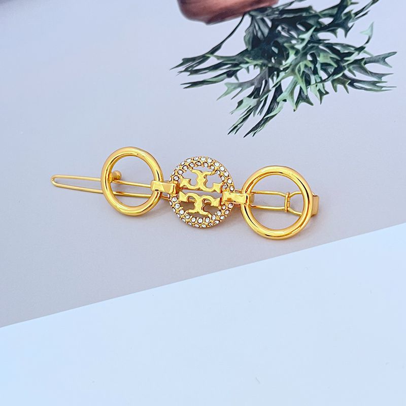 Tory Burch Diamond-Studded Round Metal Hair Clip