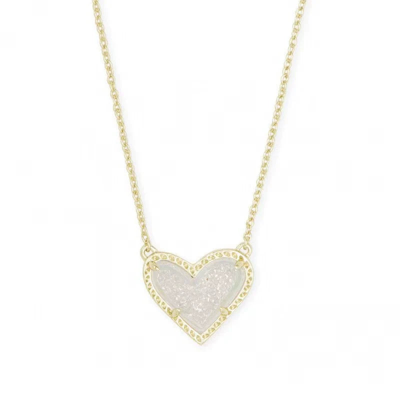 Heart pendant necklace with white glitter heart and gold-tone chain
