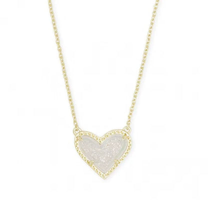 Heart pendant necklace with white glitter heart and gold-tone chain