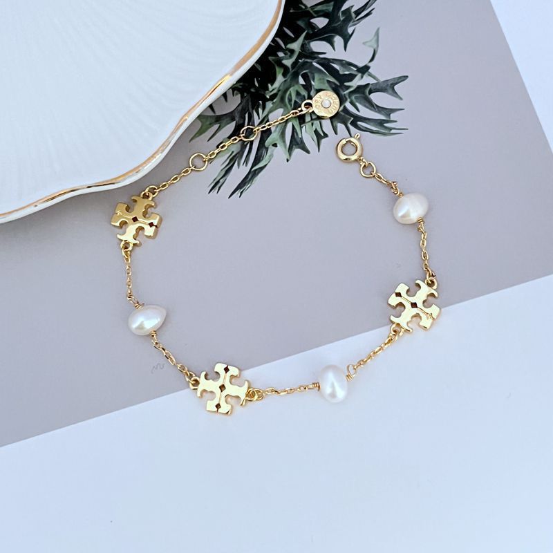 Tory Burch Elegant Natural Pearl Metal Bracelet for Women