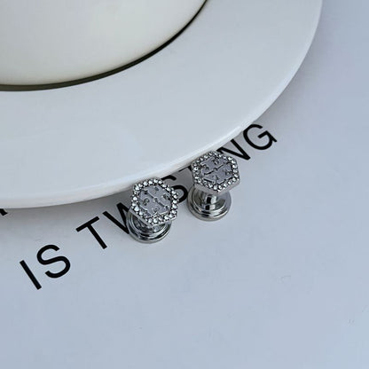 Silver-tone hexagonal openwork metal stud earrings with pavé gems