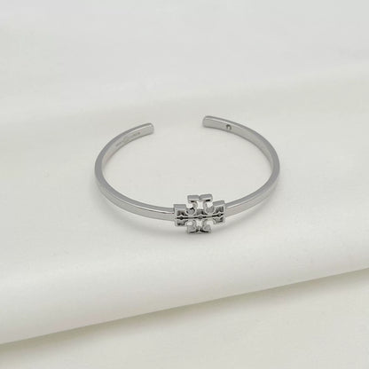 Openwork square logo smooth metal bangle, silver tone with central emblem detail