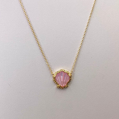 Gold-tone scallop pendant necklace with pink mother-of-pearl shell center