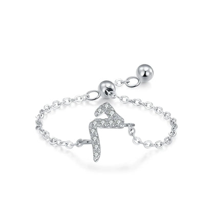 Adjustable silver pavé Arabic letter ring with CZ stones, side view on chain band