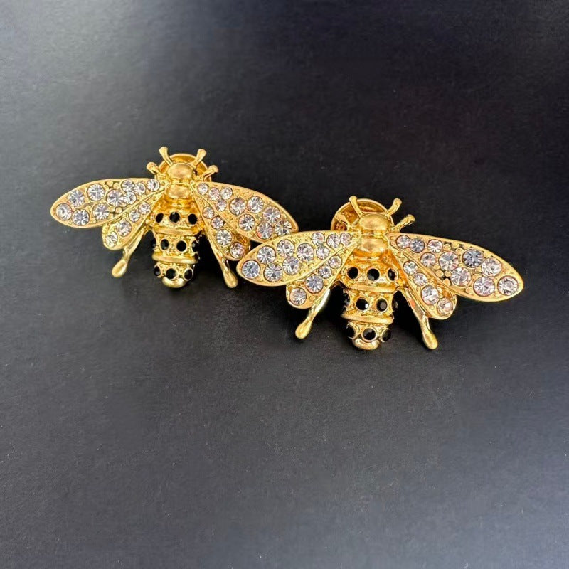 Crystal-wing bee earrings, gold-tone insect with clear stone accents