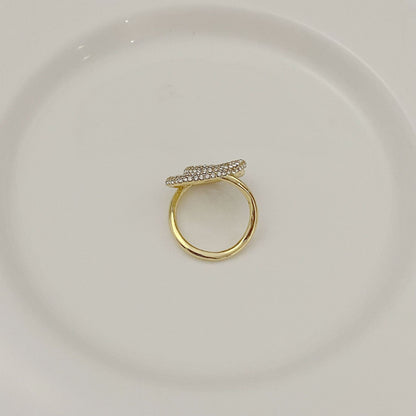 Gold-tone ring with pavé crystal double-loop design