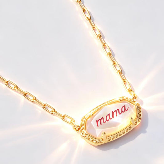 Gold letter “mama” oval pendant necklace with chunky link chain and scalloped border