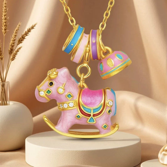 Enamel rocking horse necklace, pink carousel-style horse charm on gold chain