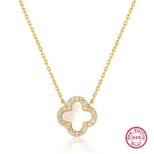 Gold clover necklace with mother-of-pearl center and sparkling crystal border pendant