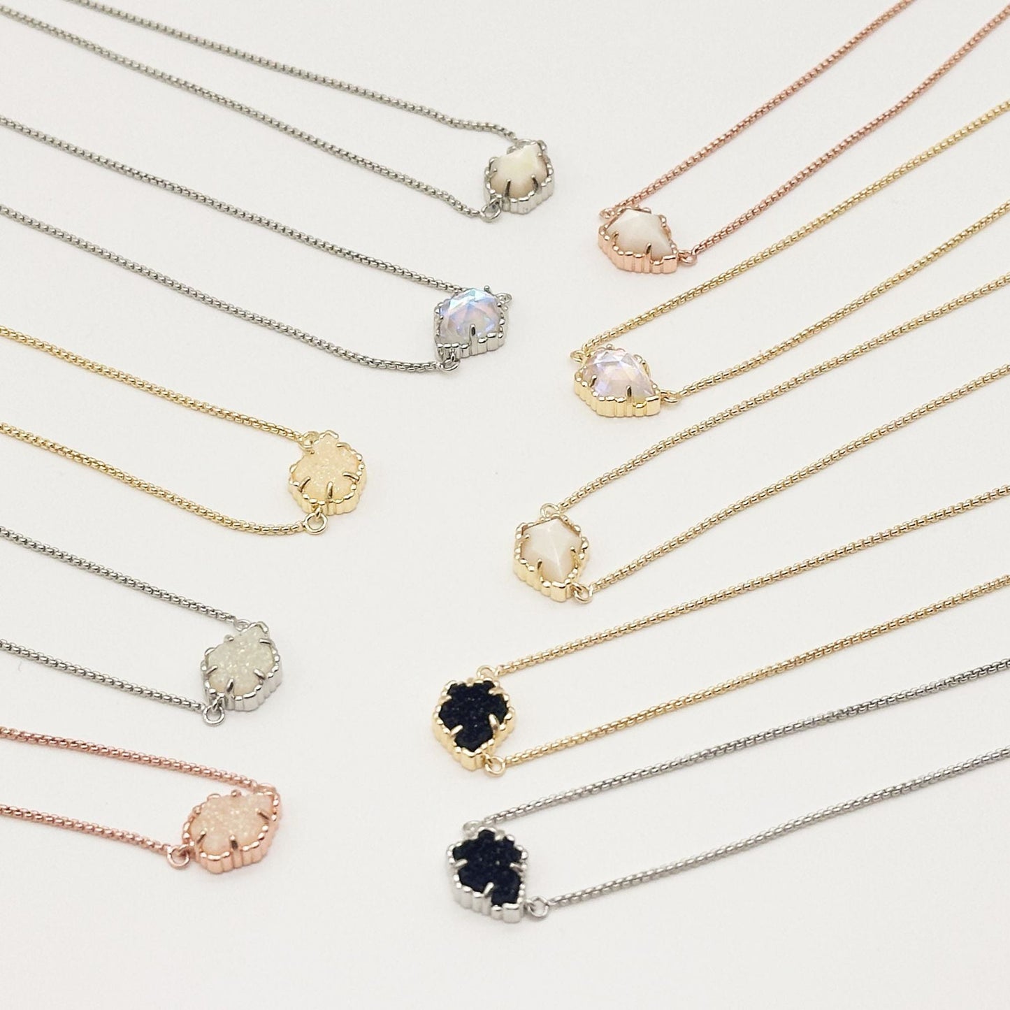 Set of Kendra Scott mother-of-pearl necklaces with rhombus pendants in mixed tones