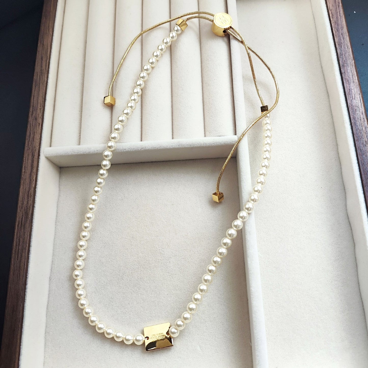 Miu Miu Adjustable Drawstring Elegant Tag Pearl Necklace