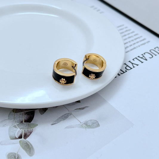 Tory Burch enamel hoop earrings, black and gold geometric logo detail