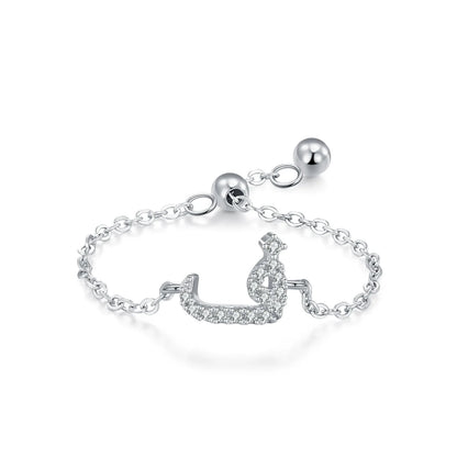 Adjustable silver pavé Arabic letter ring with CZ stones, letter detail on chain band