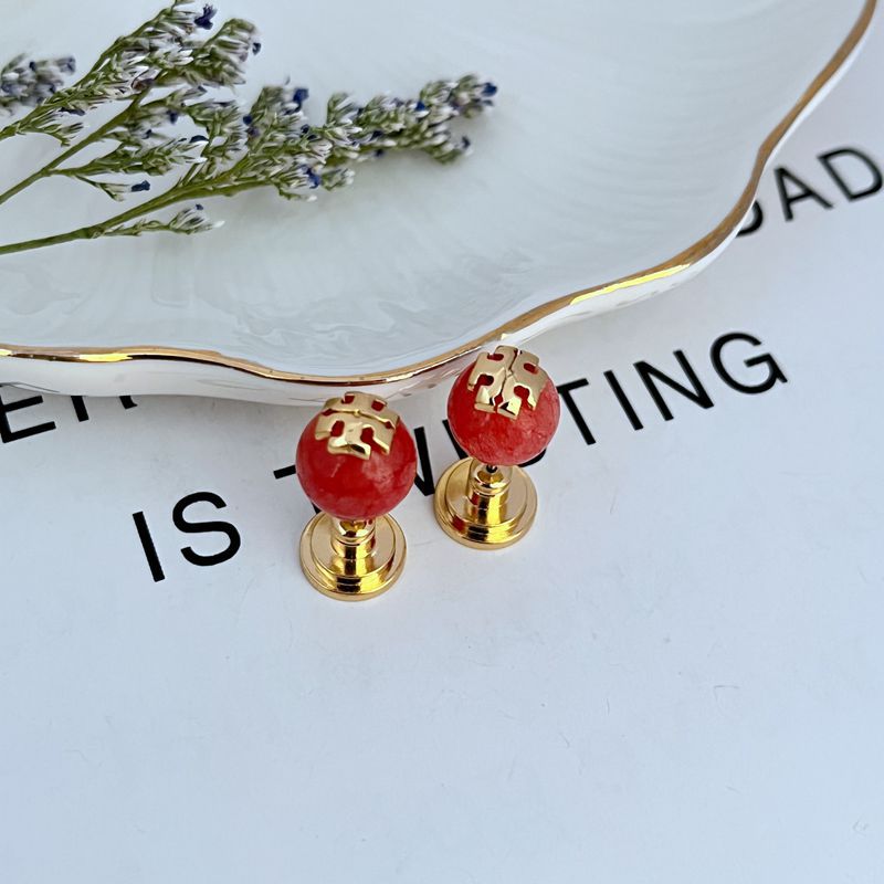 Red round pearl geometric stud earrings with gold-tone posts and backs