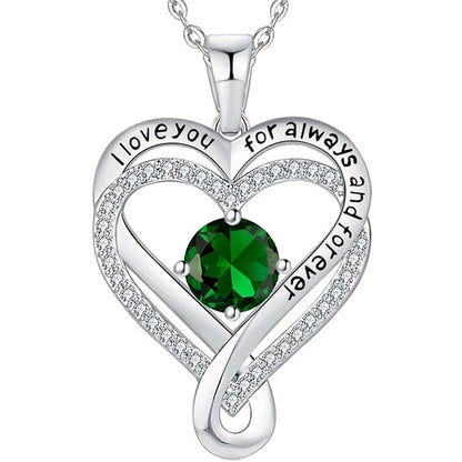 Silver heart pendant necklace with green round gemstone and pave accents