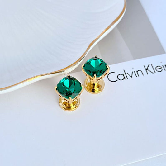 Gold-tone square stud earrings with green rhinestone squares