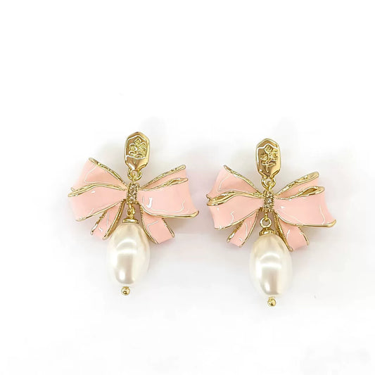Pink enamel bow pearl drop earrings with gold-tone bow and teardrop pearls