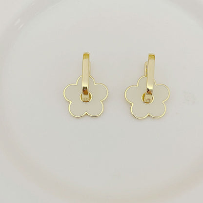 Tory Burch Elegant Floral Logo U-Shaped Metal Earrings