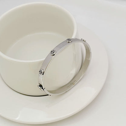 Tory Burch Embossed Logo Metal Bracelet Open women