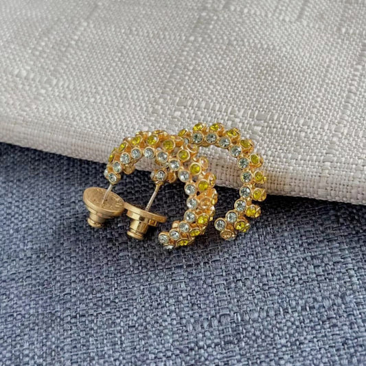 Gold-tone hoop earrings with multicolor cubic zirconia stones