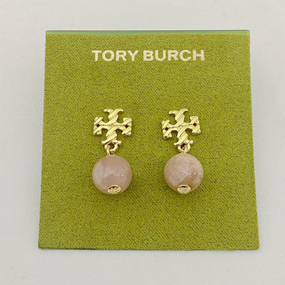 Gold-tone agate pendant earrings with round pale rose stones and leaf-like motif