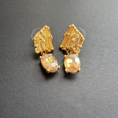Gold-tone crystal drop earrings with oval light yellow stones