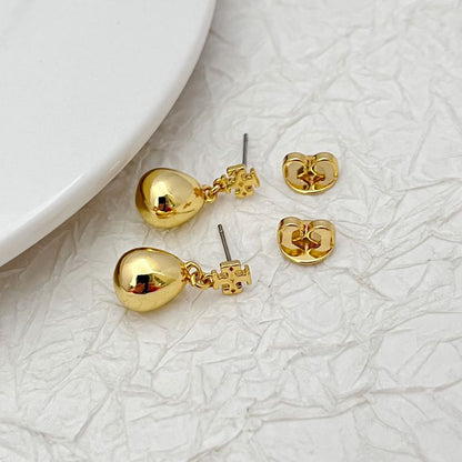 Tory Burch Gold-tone Shiny Teardrop Pendant Earrings