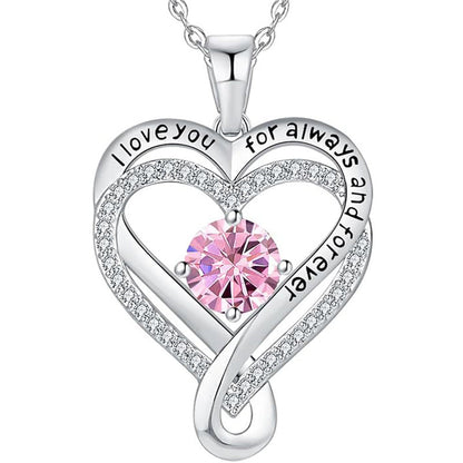 Silver heart pendant necklace with pink round gemstone and engraved heart message