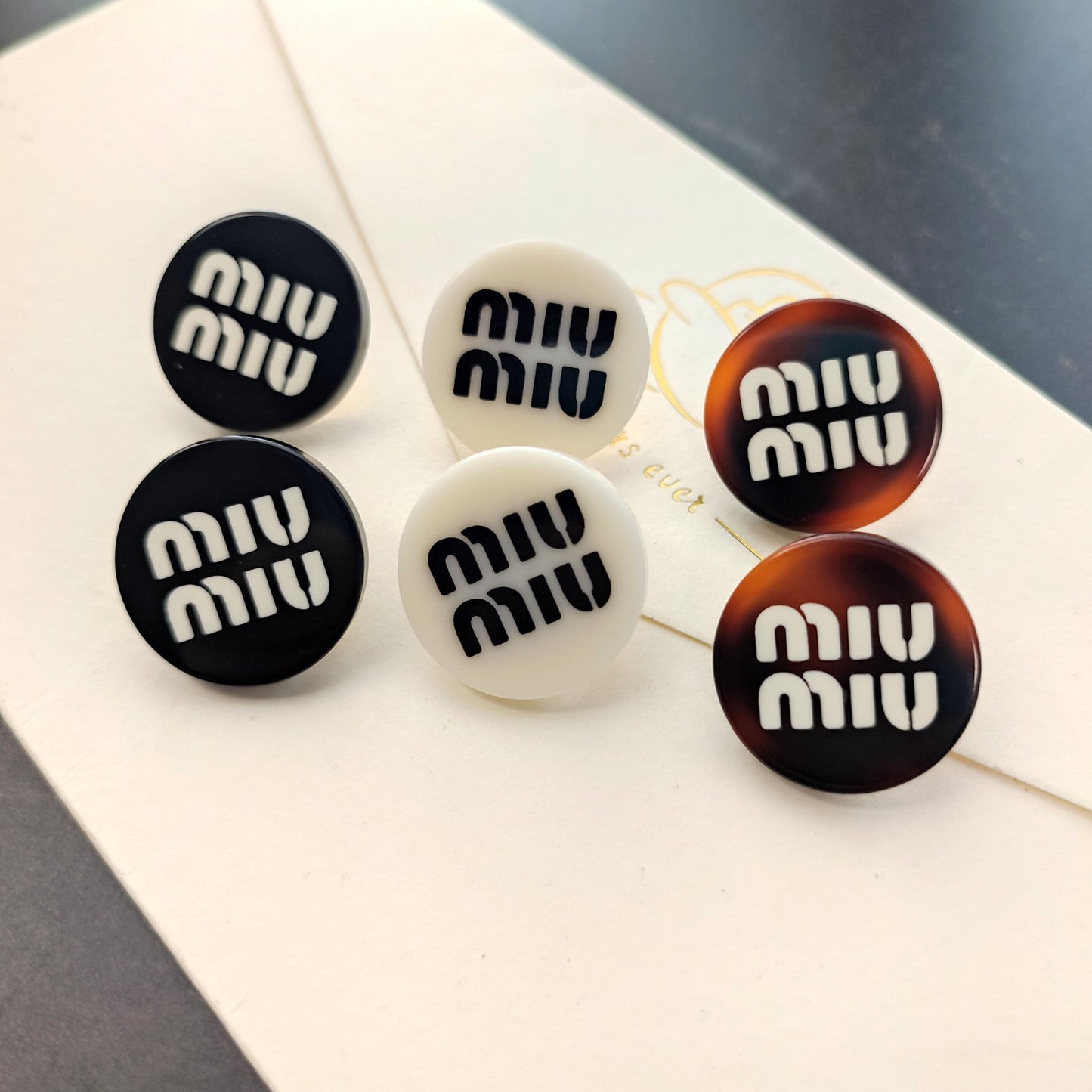 Miu Miu Versatile Round Resin Button Stud Studs for Women