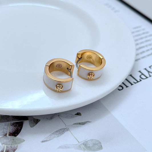 Tory Burch enamel hoop earrings, white and gold geometric logo details