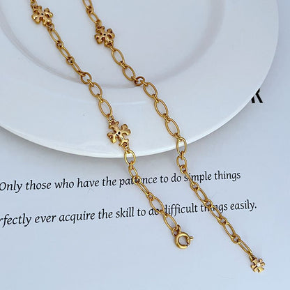 Gold-tone chain with clover logo links and loop clasp ends