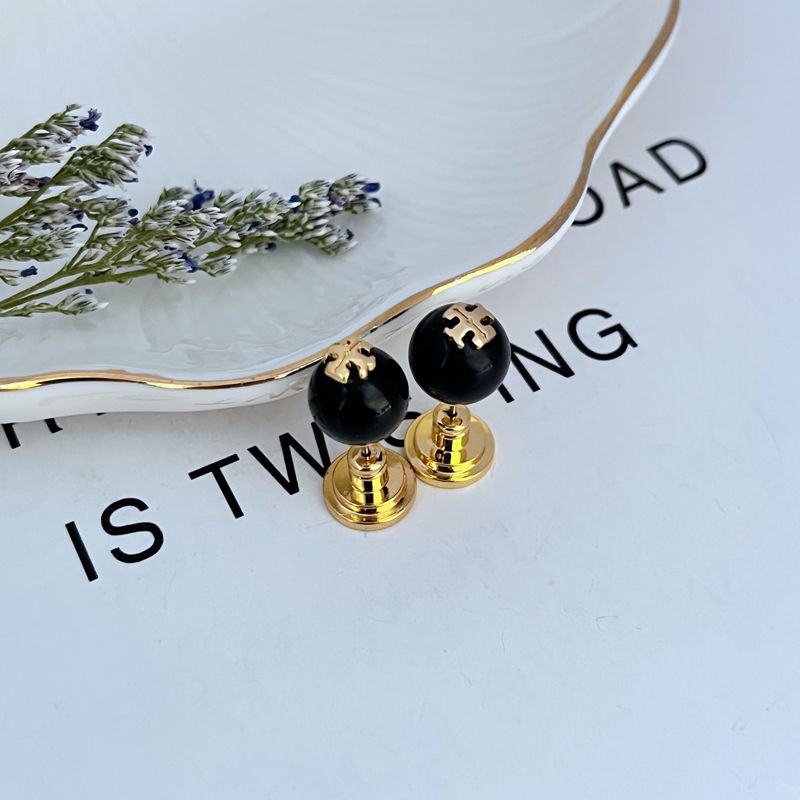 Black round pearl geometric stud earrings with gold-tone posts and backs