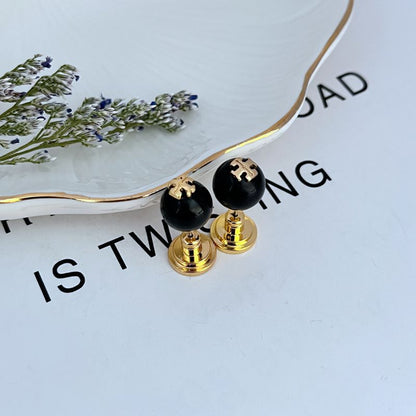 Black round pearl geometric stud earrings with gold-tone posts and backs