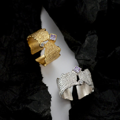 Unique textured sterling silver ring with opening